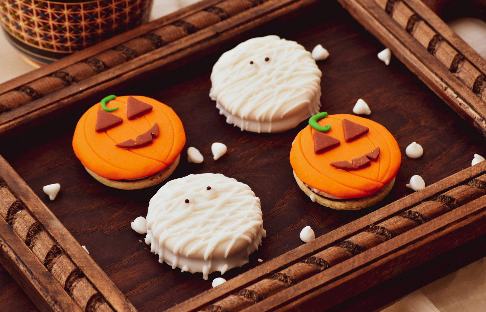 Children enjoying Halloween with teal pumpkin and gluten free cookies from Steve & Andy’s