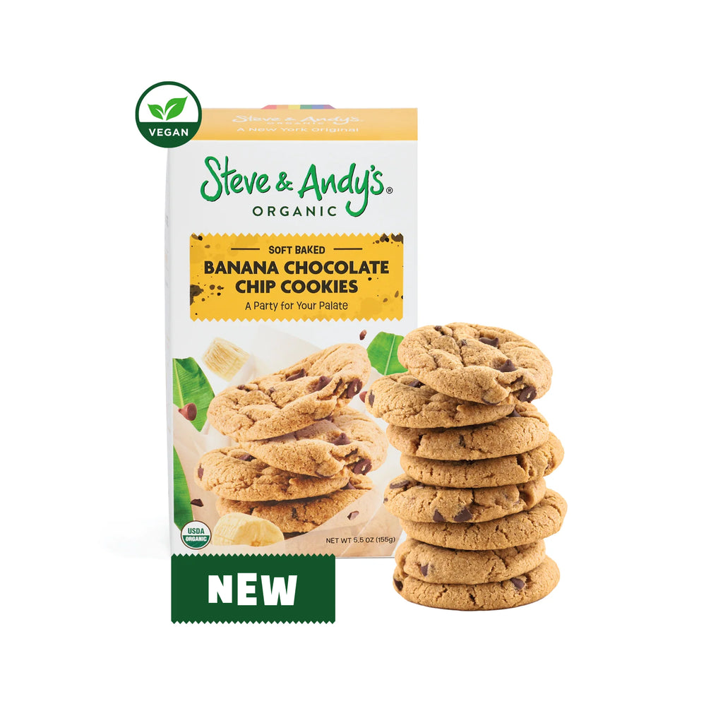 A package of Steve & Andy's Organic Banana Chocolate Chip Cookies with the cookies displayed in front of the box. The packaging has a 'Vegan' label and indicates the product is soft-baked.