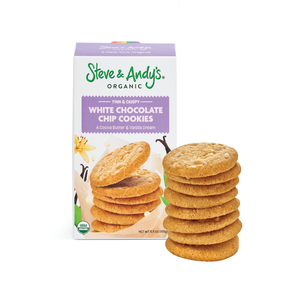 A box of Steve & Andy's Organic White Chocolate Chip Cookies with several cookies displayed in front of the box.